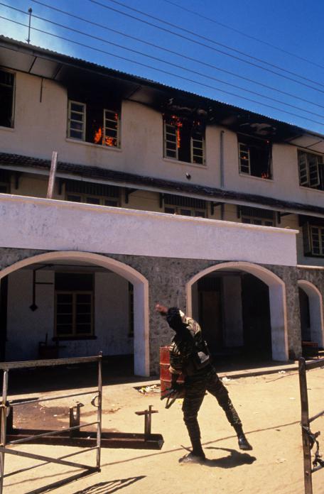 LTTE militant throwing hand grenade into police station, Batticaloa, 1990