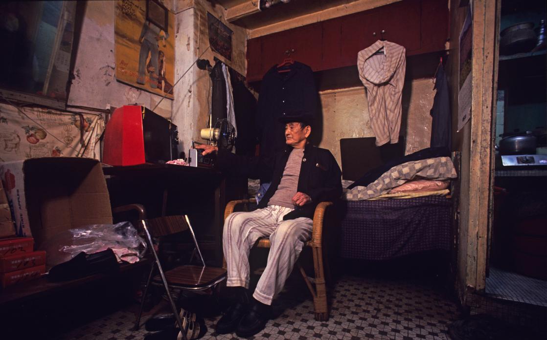 Walled city resident in his 7x12 ft home, 1989